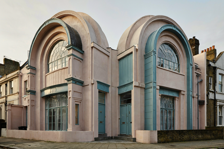 Illustration of pale-pink, architecturally distinct semi-detached homes with blue metalwork in a North London setting.