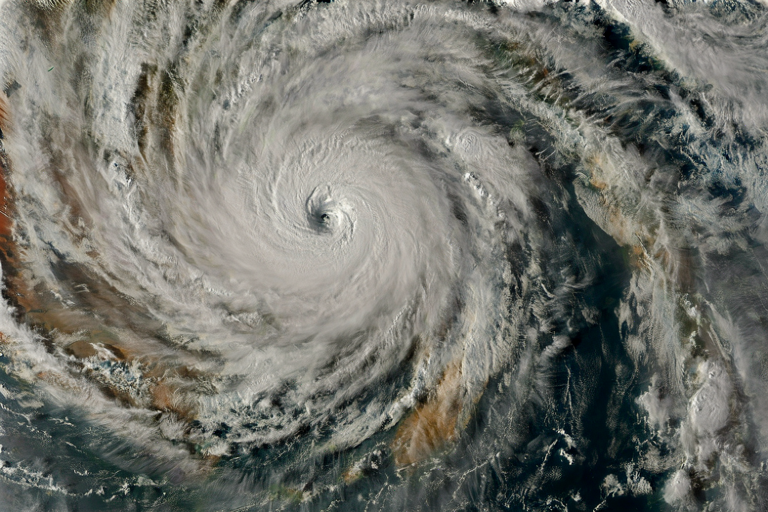 Conceptual illustration of a powerful tropical cyclone over a warm ocean.