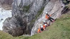 Source image accompanying Irish Coast Guard Rescues Engaged Couple Trapped by Incoming Tide on Achill Island